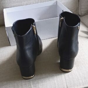 Calvin Klein Black Ankle Booties with Gold Accents